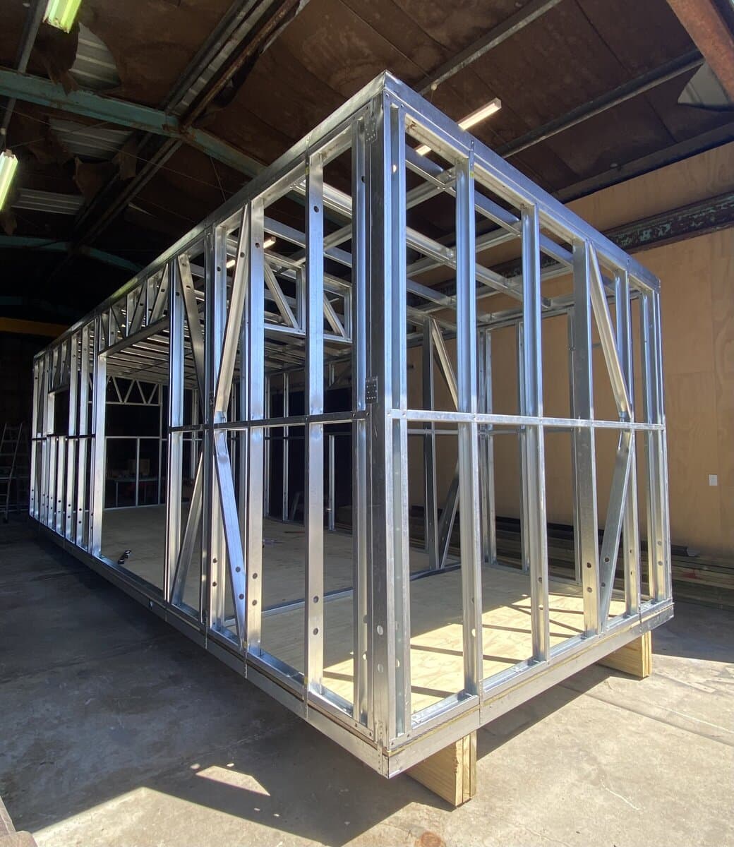 Light gauge steel frame — base, walls and roof — mid-build in the Smart Housing Solutions workshop