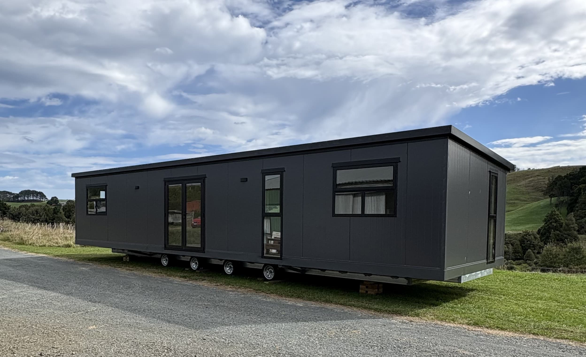 14×4 economy tiny home on a rural New Zealand site