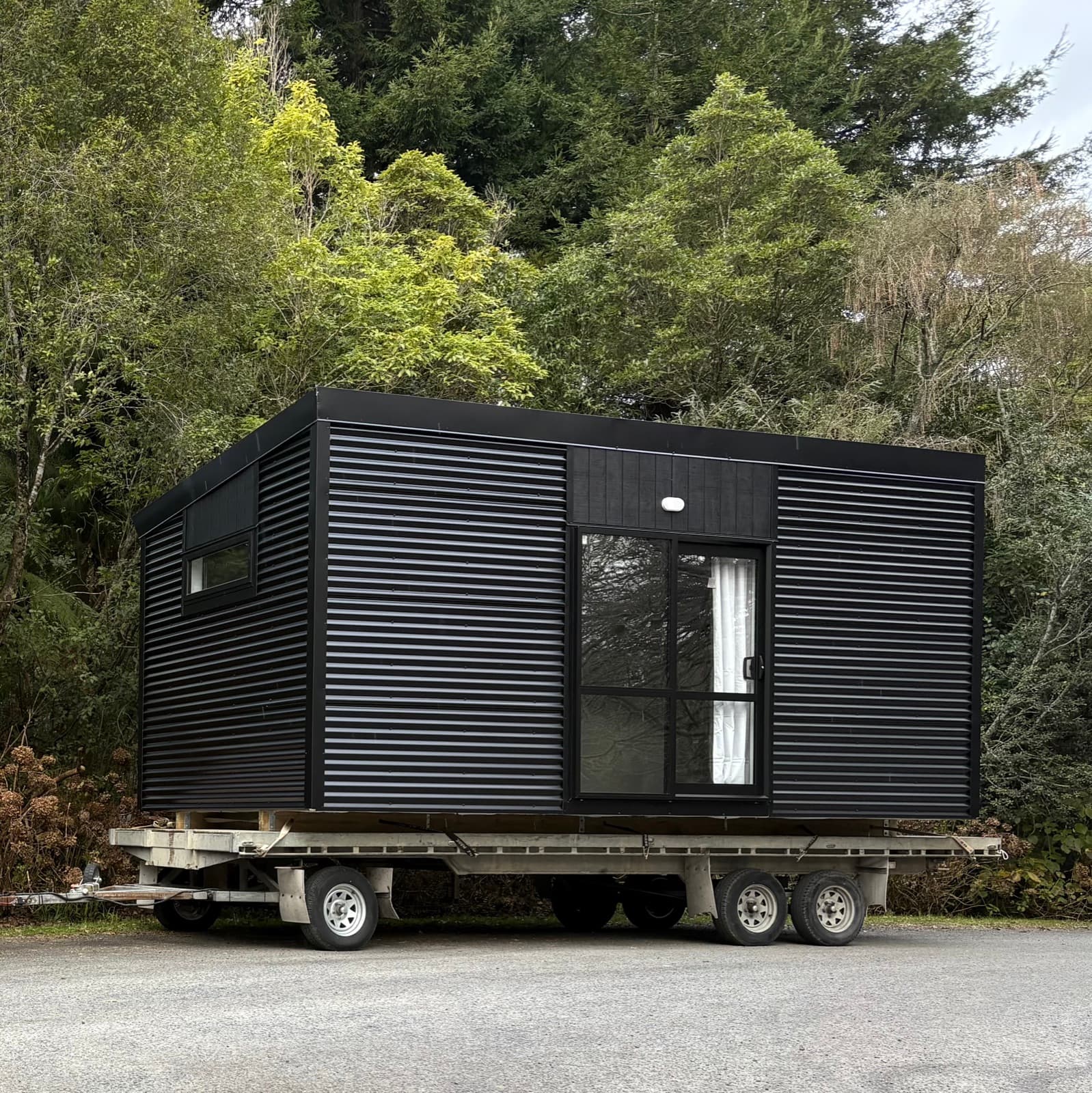 Smart Housing Solutions cabin exterior with dark cladding