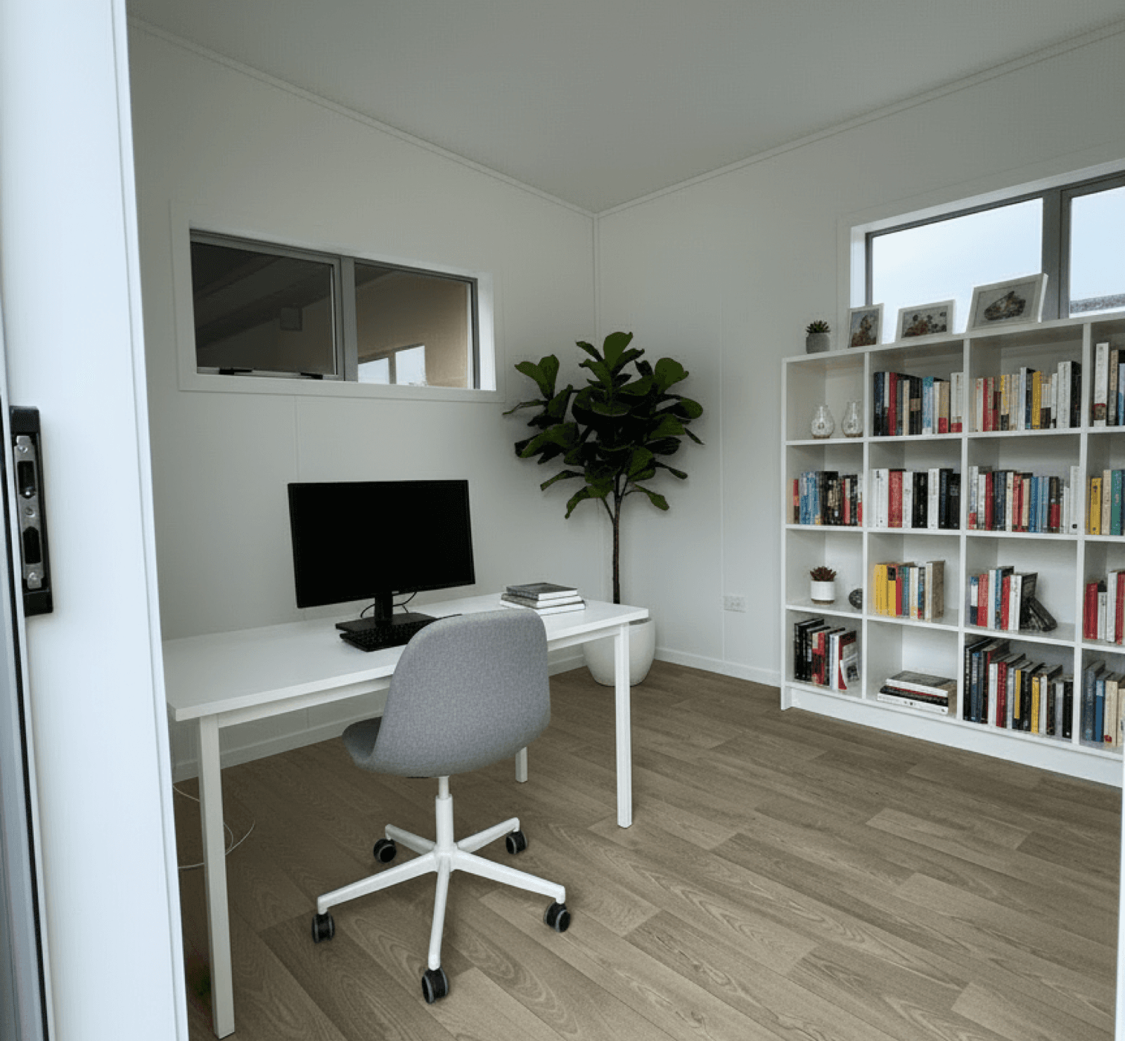 Sleepout cabin interior fitted out as a teen retreat / home office