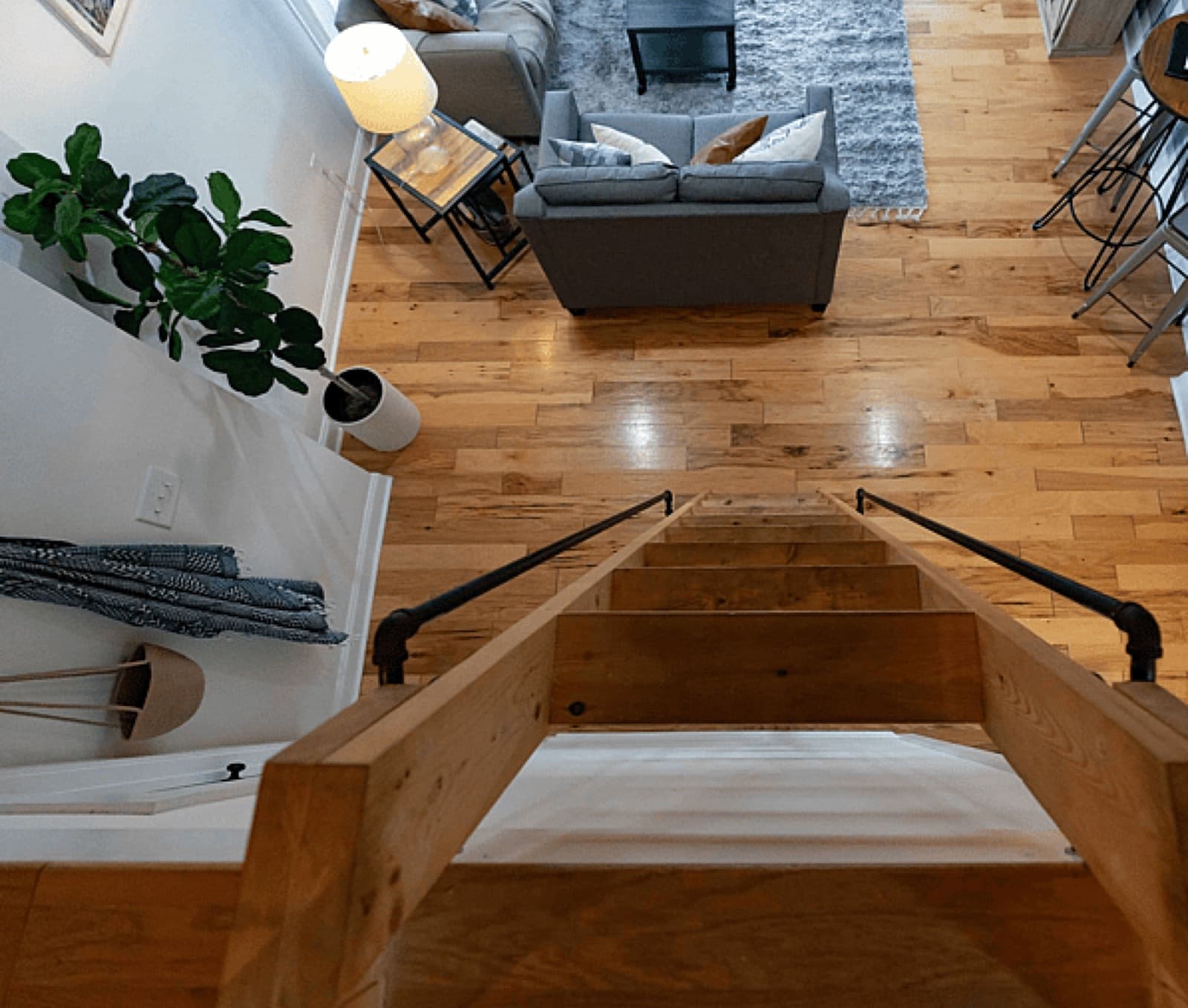 Open-plan tiny home interior with kitchen and living area