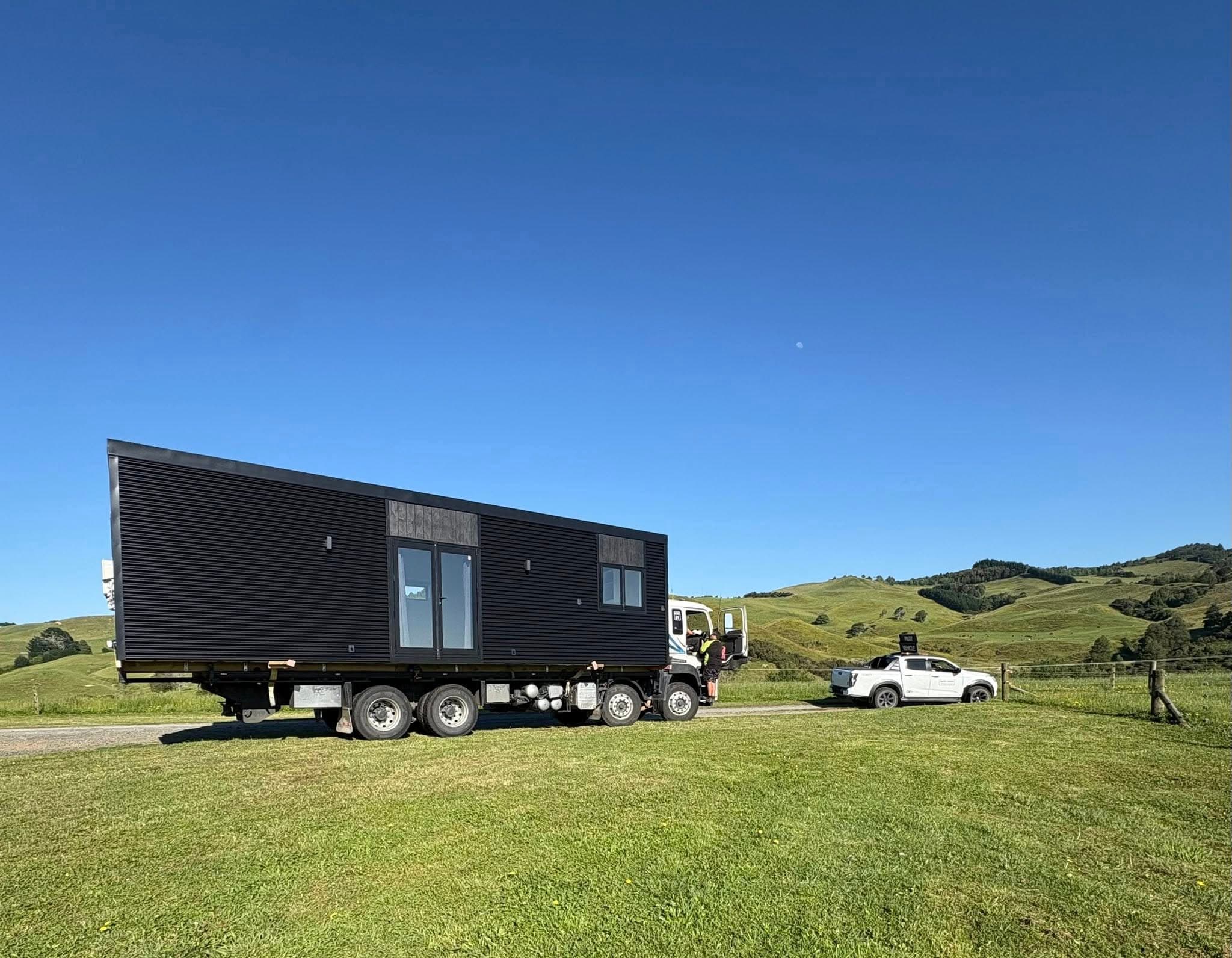 SHS transportable home loaded on truck for delivery